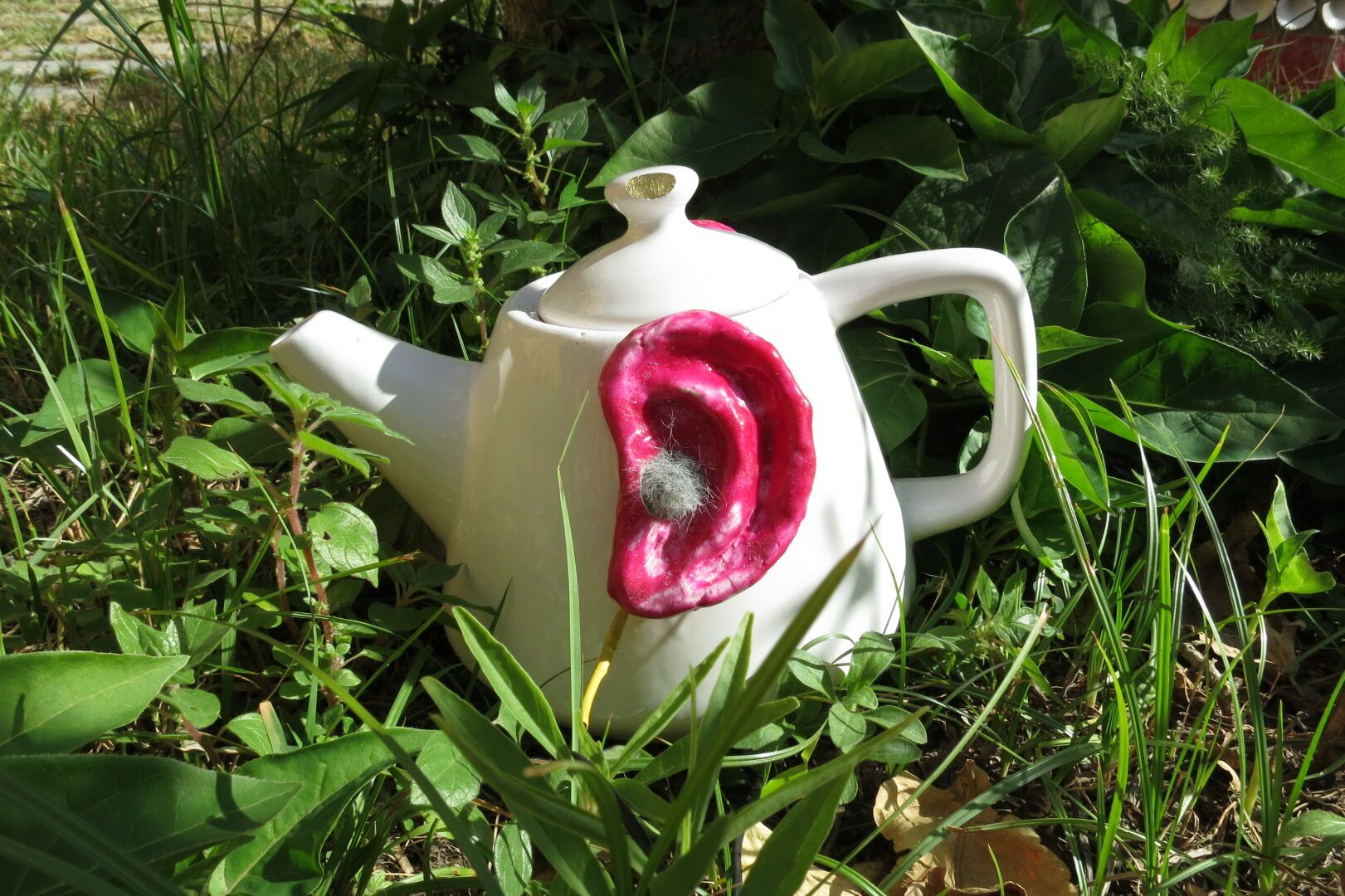 a binaural mic in the shape of a teapot